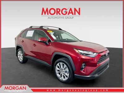 2025 Toyota RAV4 XLE Premium in Ruby Flare Pearl — front three-quarter view