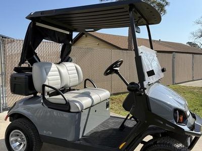 2023 E-Z-GO Express S2 ELiTE Lithium Ocean Grey — rear three-quarter view