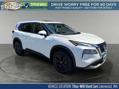 2023 Nissan Rogue SV in Pearl White — front three-quarter view