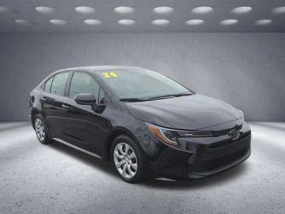 2024 Toyota Corolla LE in Black — front three-quarter view