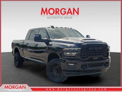 2025 Ram 2500 Laramie in Diamond Black Crystal Pearlcoat — front three-quarter view