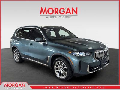 2024 BMW X5 sDrive40i in Blue — front three-quarter view