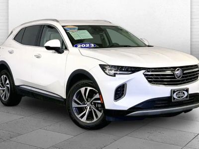 2023 Buick Envision Essence in Summit White — front three-quarter view