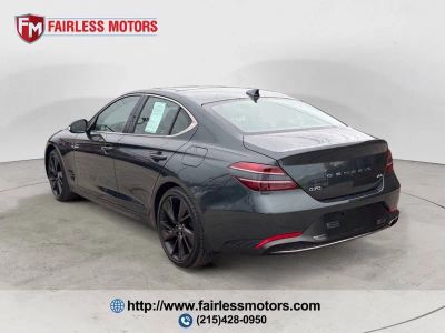 2023 Genesis G70 — rear three-quarter view
