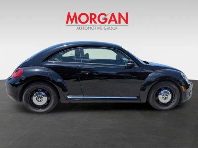 2015 Volkswagen Beetle Coupe — rear three-quarter view