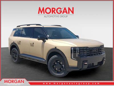 2027 Kia Telluride X-Pro SX-Prestige in Terrain Brown Matte — front three-quarter view