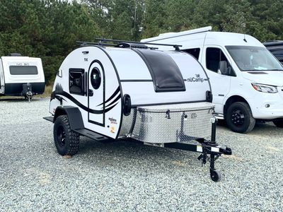 2026 nuCamp TAG XL Black Canyon — front three-quarter view