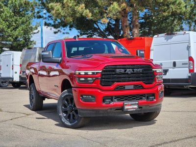 2026 RAM 2500 RAM 2500 LARAMIE CREW CAB 4X4 6'4' BOX in Molten Red Pearl-Coat Exterior Paint — front three-quarter view