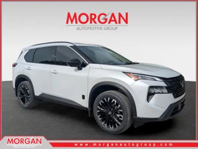 2026 Nissan Rogue Dark Armor in White — front three-quarter view