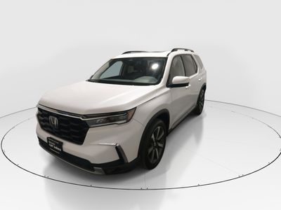 2023 Honda Pilot — rear three-quarter view