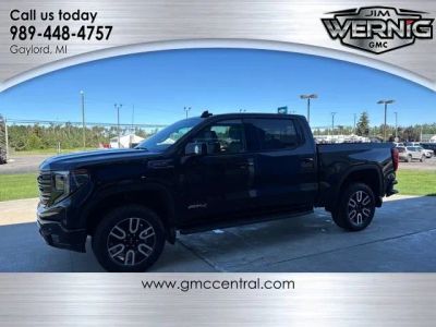 2024 GMC Sierra 1500 AT4 in Onyx Black — front three-quarter view