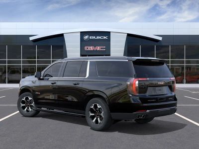 2026 GMC Yukon XL — rear three-quarter view