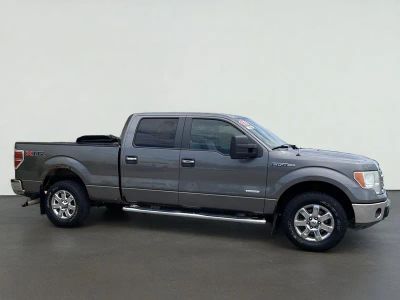 2013 Ford F-150 XLT in Gray — front three-quarter view