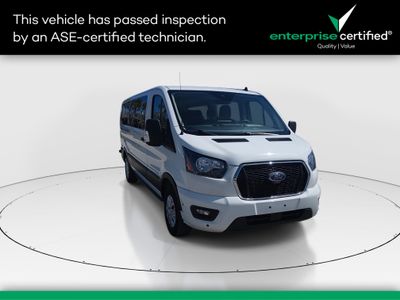 2024 Ford Transit Passenger Wagon T-350 148" Low Roof XLT RWD — front three-quarter view