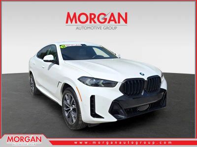 2026 BMW X6 xDrive40i in Alpine White — front three-quarter view