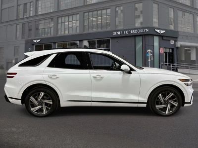 2026 Genesis GV70 — rear three-quarter view