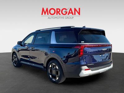 2026 Kia Carnival — rear three-quarter view