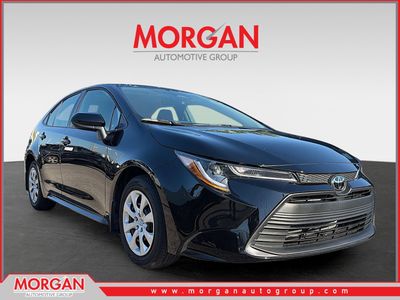 2026 Toyota Corolla LE in Midnight Black Metallic — front three-quarter view