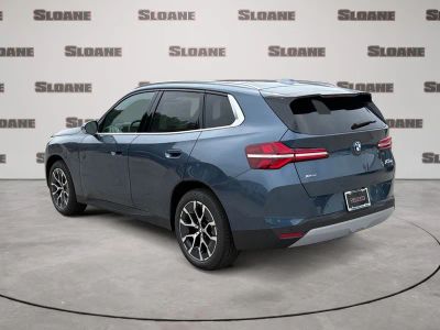 2026 BMW X3 — rear three-quarter view