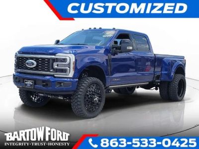 2026 Ford F-350SD Platinum DRW / LIFTED WHEELS & TIRES in Blue Metallic — front three-quarter view