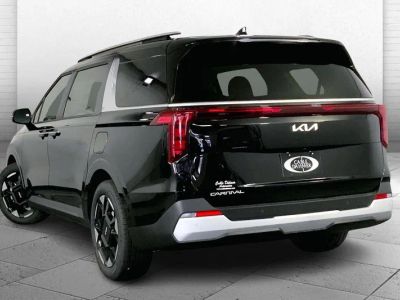 2026 Kia Carnival — rear three-quarter view