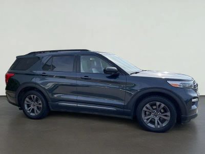 2023 Ford Explorer XLT in *Blue — front three-quarter view
