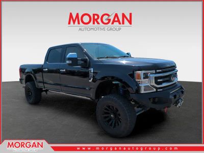 2021 Ford F-250SD Platinum in Black — front three-quarter view