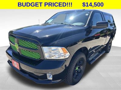 2015 RAM 1500 Express in Black Clearcoat — front three-quarter view