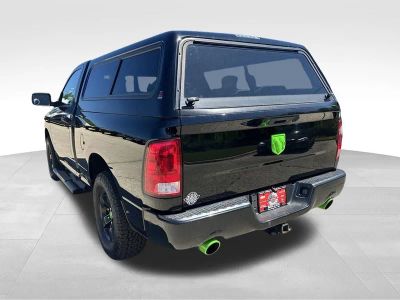 2015 RAM 1500 — rear three-quarter view