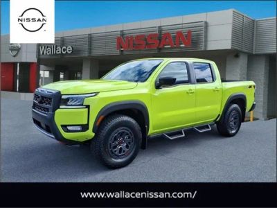2026 Nissan Frontier PRO-4X in Citrus Strike Green — front three-quarter view