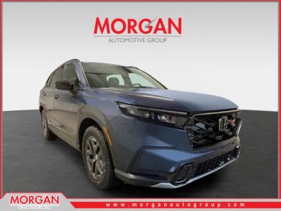 2026 Honda CR-V Hybrid TrailSport in Canyon River Blue Metallic — front three-quarter view