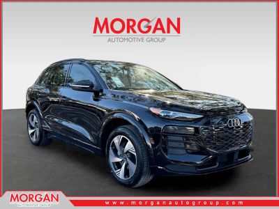 2025 Audi Q6 e-tron Premium in Mythos Black Metallic — front three-quarter view