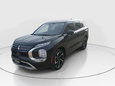 2024 Mitsubishi Outlander — rear three-quarter view