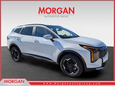 2026 Kia Sportage Hybrid EX in Snow White Pearl — front three-quarter view