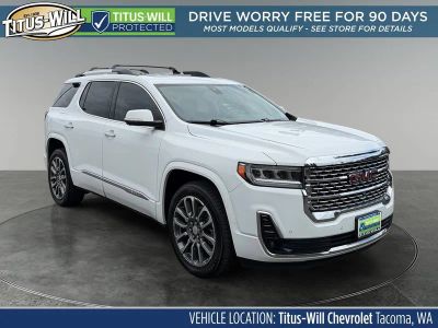 2022 GMC Acadia Denali in Summit White — front three-quarter view