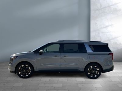 2026 Kia Carnival — rear three-quarter view