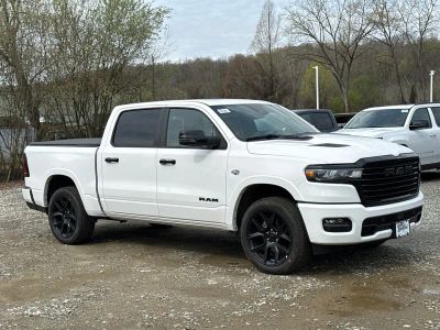 2026 RAM 1500 Laramie in Bright White Clearcoat — front three-quarter view