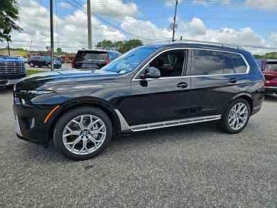 2025 BMW X7 — rear three-quarter view