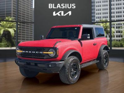 2022 Ford Bronco Wildtrak in Red — front three-quarter view