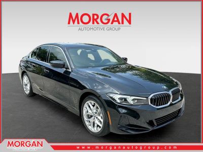 2025 BMW 3 Series 330i in Black — front three-quarter view