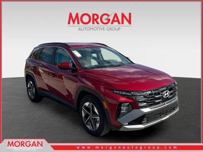 2026 Hyundai TUCSON SEL in Ultimate Red — front three-quarter view