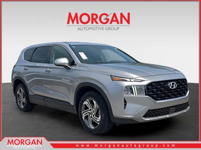 2023 Hyundai Santa Fe SE in Silver — front three-quarter view