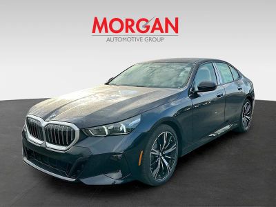 2026 BMW 5 Series — rear three-quarter view