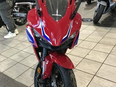 2025 Honda CBR500R in RED — front three-quarter view