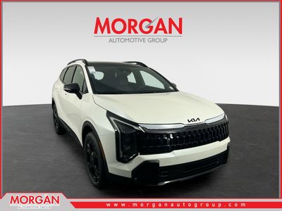 2026 Kia Sportage Hybrid X-Line in Snow White Pearl — front three-quarter view