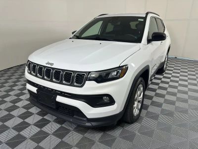 2024 Jeep Compass Latitude in White — front three-quarter view