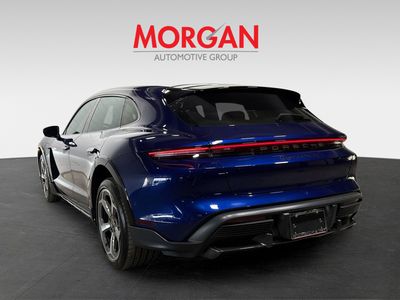 2022 Porsche Taycan — rear three-quarter view