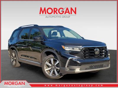 2025 Honda Pilot Elite in Crystal Black Pearl — front three-quarter view