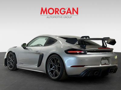2025 Porsche 718 Cayman — rear three-quarter view