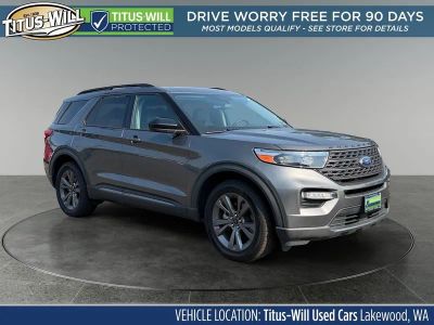 2023 Ford Explorer XLT in Gray Metallic — front three-quarter view